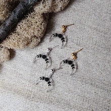 Load image into Gallery viewer, Crescent Moon Dangles in Clear with Black Detailing