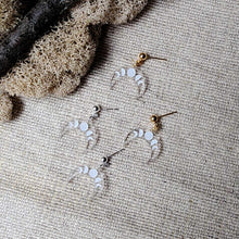 Load image into Gallery viewer, Crescent Moon Dangles in Clear with White Detailing