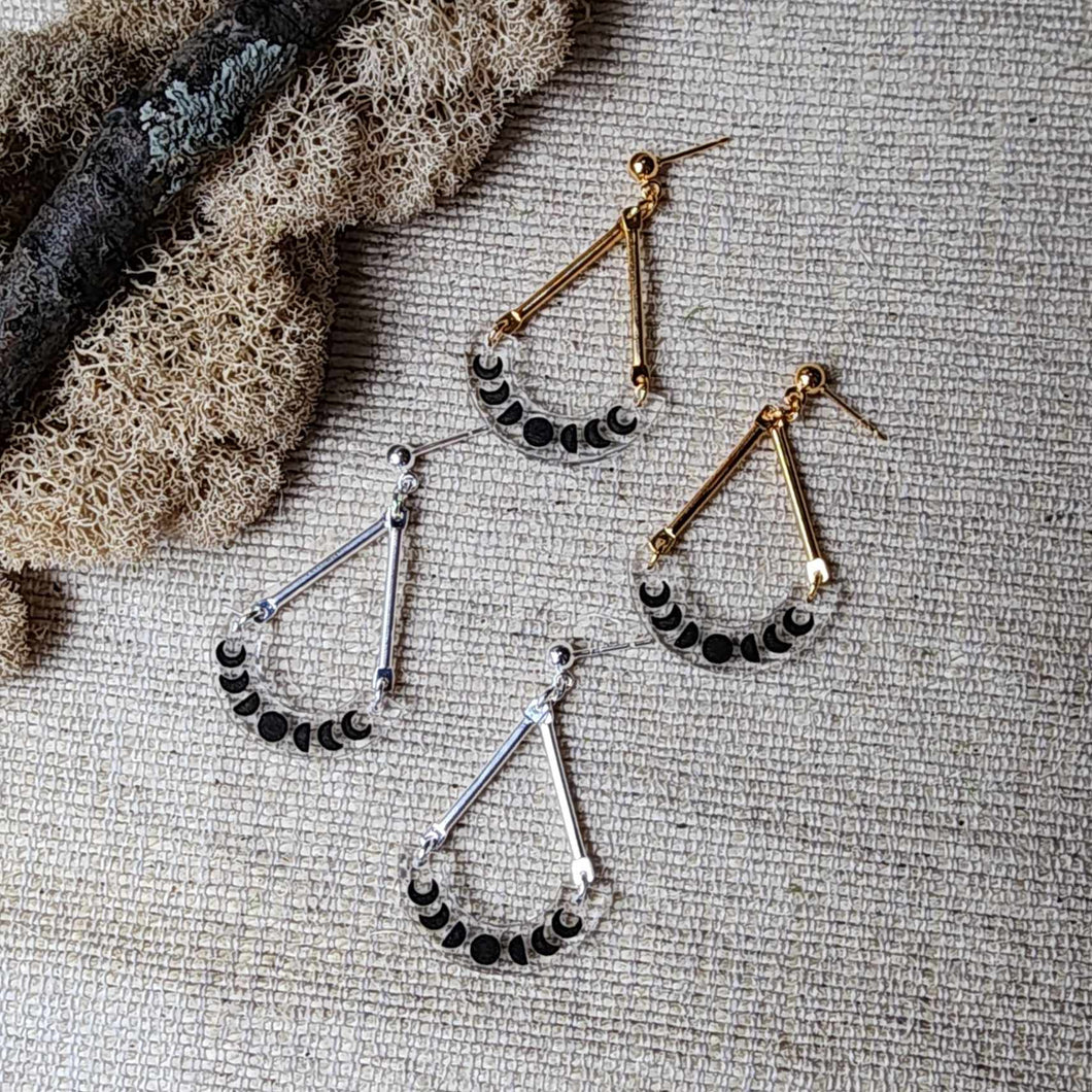 Scale Dangles in Clear with Black Detailing